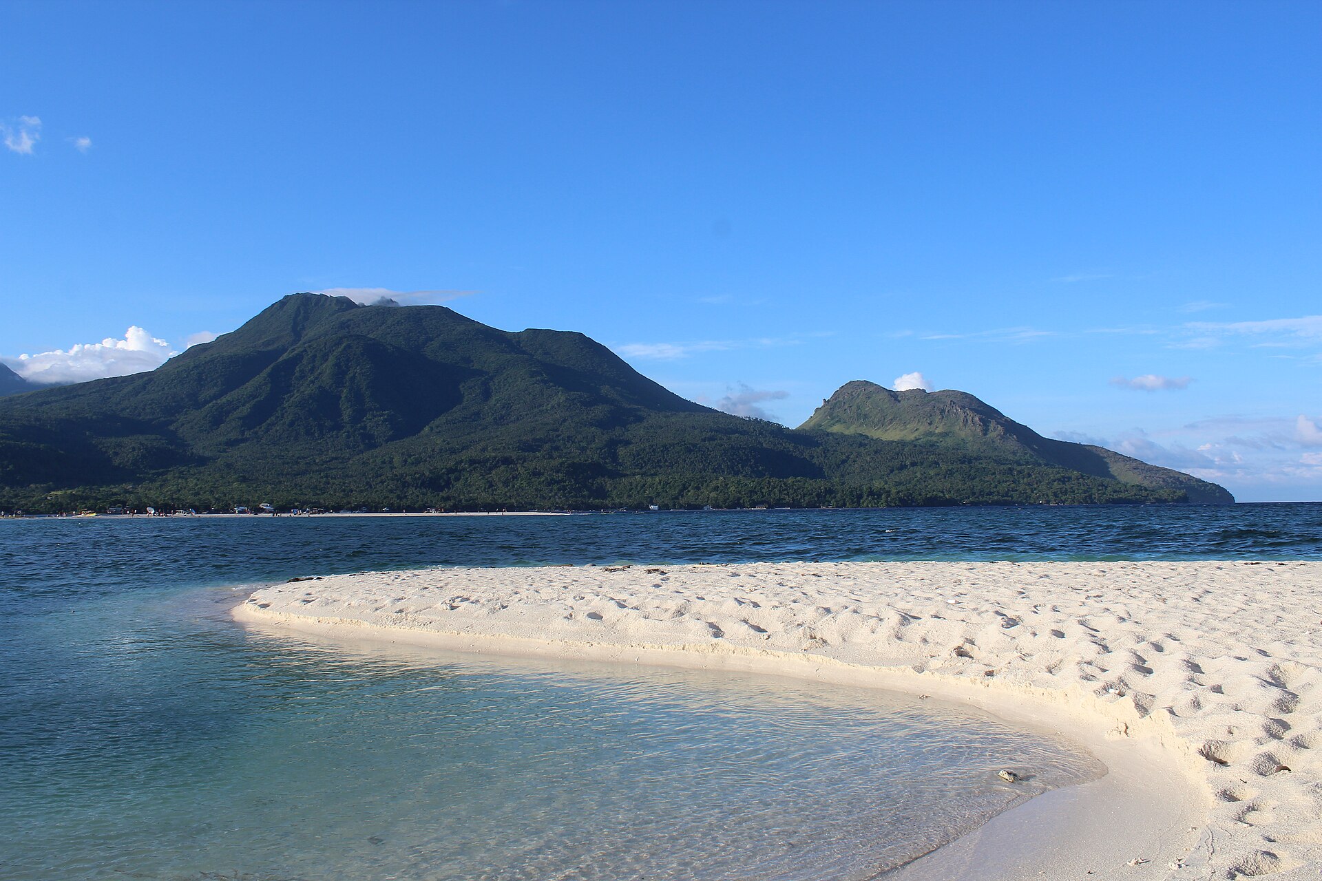 The volcanic landscape of southern Camiguin, viewed from White Island in the Bohol Sea.