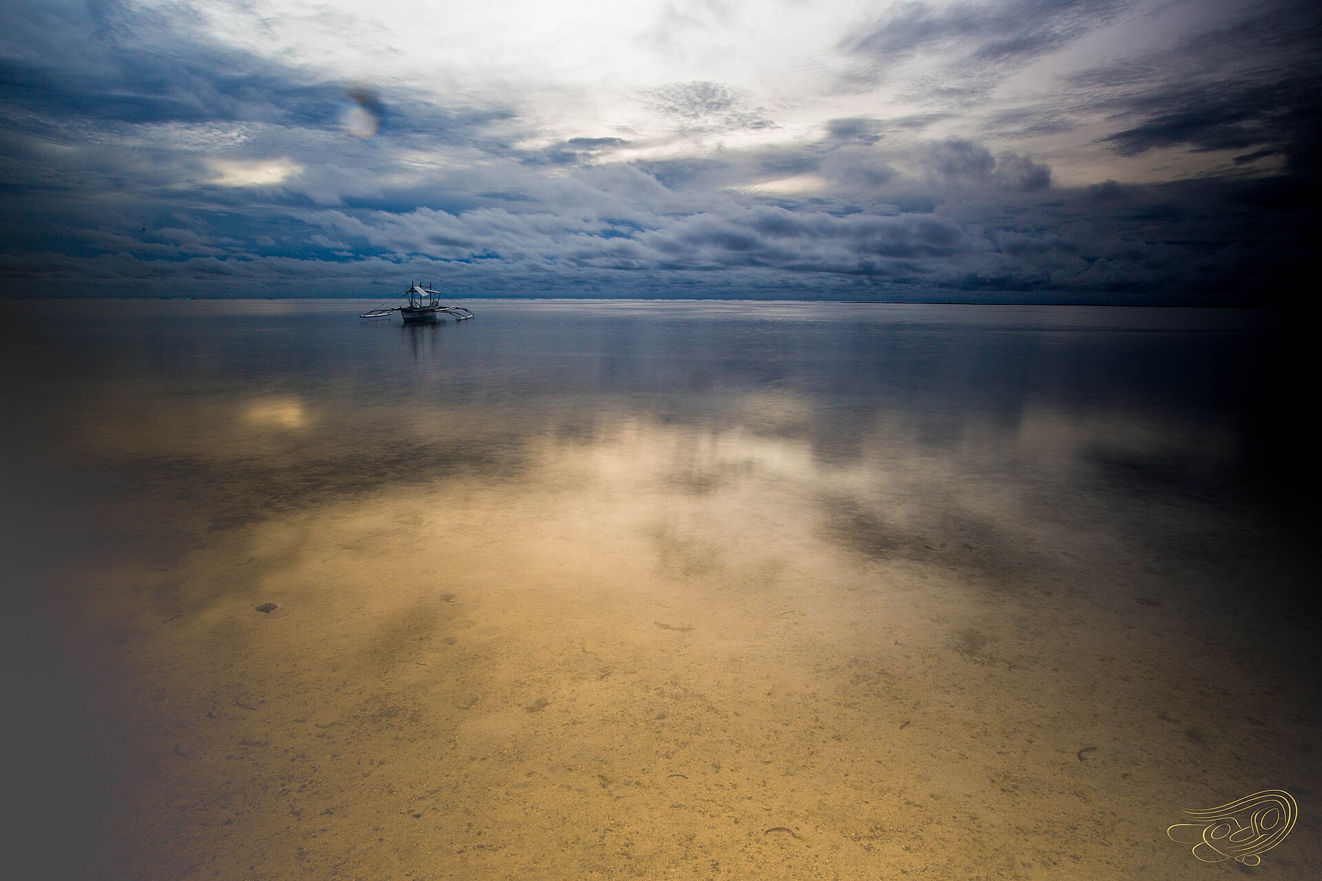 Shallow coastal water and the reef-facing shoreline of Siargao.